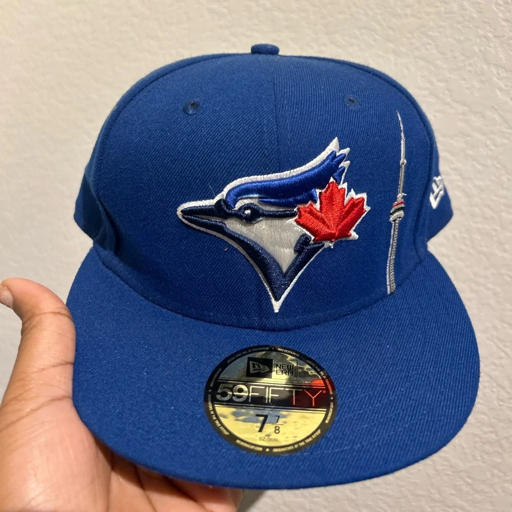 New Era Blue Cap with Embroidered Bird and Leaf